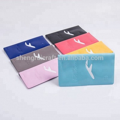 Newest selling cheap soft colorful PVC passport holder with embossing logo